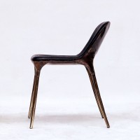 <a href="https://www.galeriegosserez.com/artistes/loellmann-valentin.html">Valentin Loellmann </a> - Brass - Black Chair with Closed Back